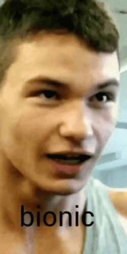 A Close Up Of A Man 'S Face With The Word Bionic Written Below It GIF