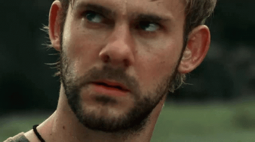 A Close Up Of A Man 'S Face With The Word Guys Written Below Him GIF