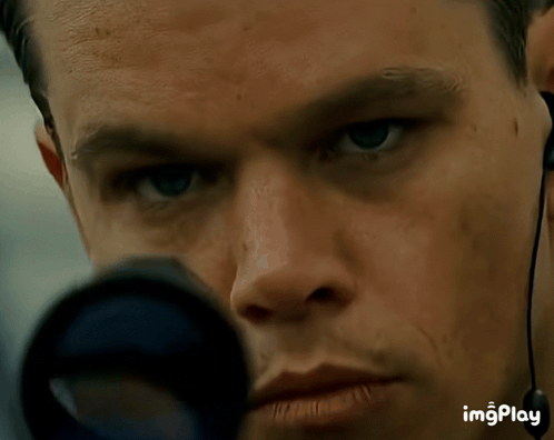 A Close Up Of A Man 'S Face With The Word Imgplay Visible In The Corner GIF