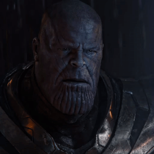 A Close Up Of A Man 'S Face With The Word Impossible Above It GIF