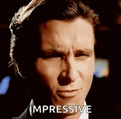 A Close Up Of A Man 'S Face With The Word Impressive On It . GIF