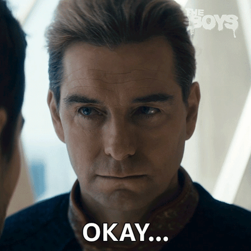 A Close Up Of A Man 'S Face With The Word Okay On It GIF