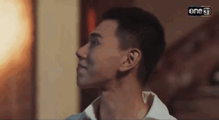 A Close Up Of A Man 'S Face With The Word One On The Bottom Left Corner . GIF