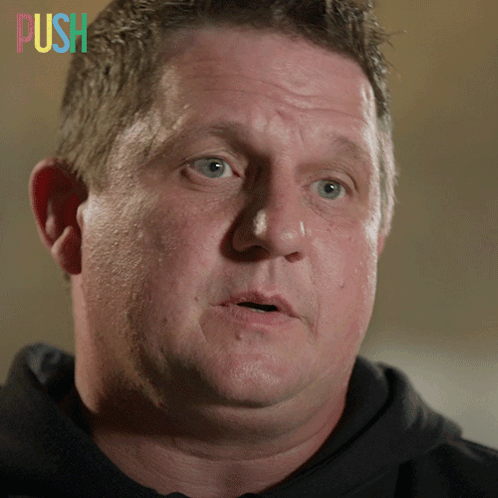 A Close Up Of A Man 'S Face With The Word Push On The Bottom GIF