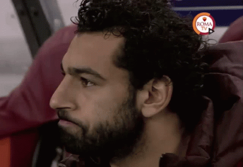 A Close Up Of A Man 'S Face With The Word Roma Tv On The Bottom GIF