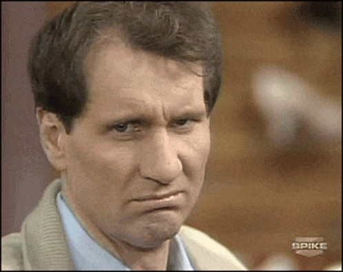 Close Up Of Man's Face With Spike Text GIF