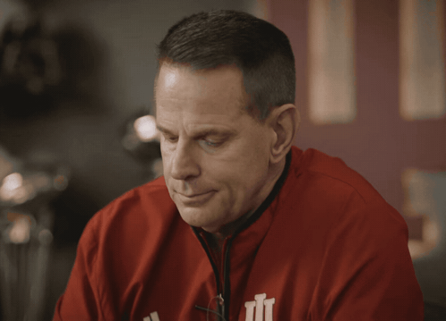 A Close Up Of A Man 'S Face With The Word Winning Above Him GIF