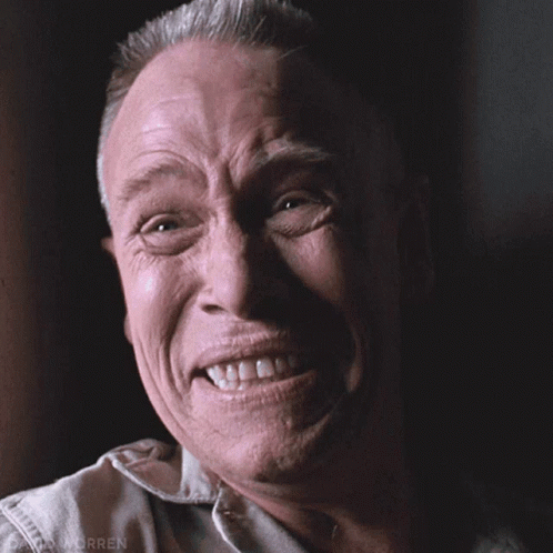 A Close Up Of A Man 'S Face With The Word Worren On The Bottom Left GIF