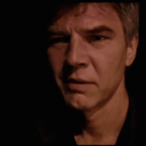 A Close Up Of A Man 'S Face With The Words " Ammen Vafan " On The Bottom GIF