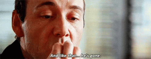 A Close Up Of A Man 'S Face With The Words `` And Like That ... He 'S Gone '' Written On It . GIF
