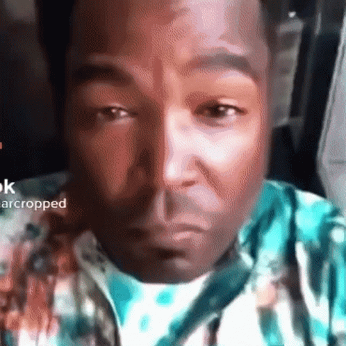 A Close Up Of A Man 'S Face With The Words " Arcropped " In The Corner GIF