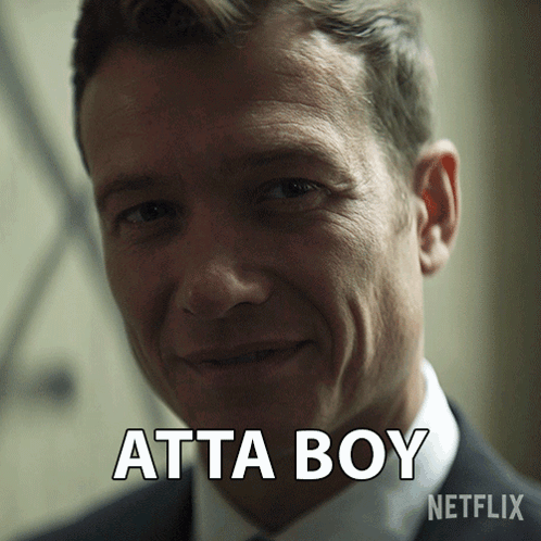 A Close Up Of A Man 'S Face With The Words Atta Boy Above Him GIF