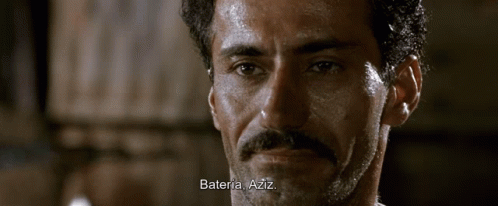 A Close Up Of A Man 'S Face With The Words Bateria Aziz Written Below Him GIF