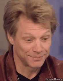 a close up of a man 's face with the words because they can be seen in the corner