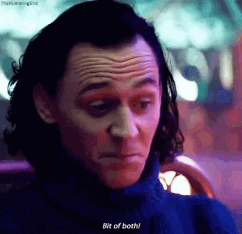 A Close Up Of A Man 'S Face With The Words `` Bit Of Both '' Written Next To Him . GIF