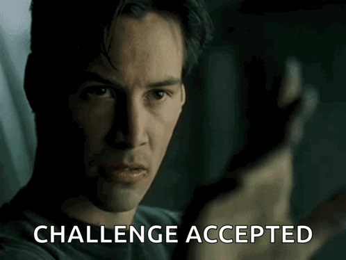 A Close Up Of A Man 'S Face With The Words Challenge Accepted Written On It GIF