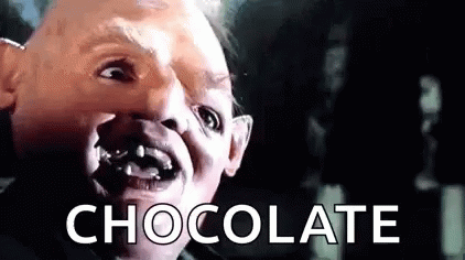 A Close Up Of A Man 'S Face With The Words `` Chocolate '' Written On The Bottom . GIF