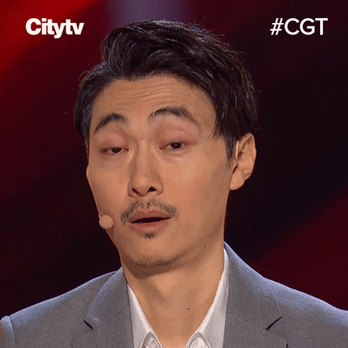 A Close Up Of A Man 'S Face With The Words Citytv Behind Him GIF