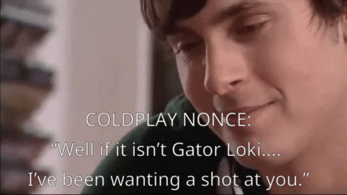 A Close Up Of A Man 'S Face With The Words " Coldplay Nonce " On Top GIF