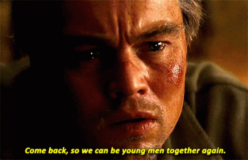 A Close Up Of A Man 'S Face With The Words Come Back So We Can Be Young Men Together Again Below Him GIF