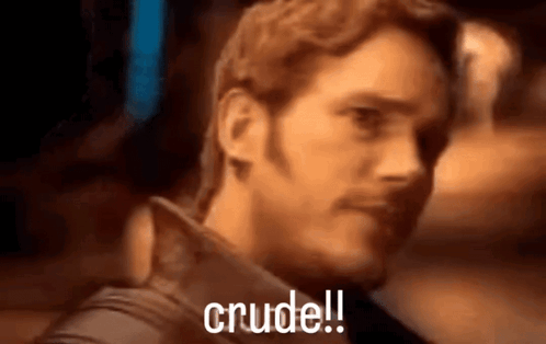 a close up of a man 's face with the words crudel written on it .