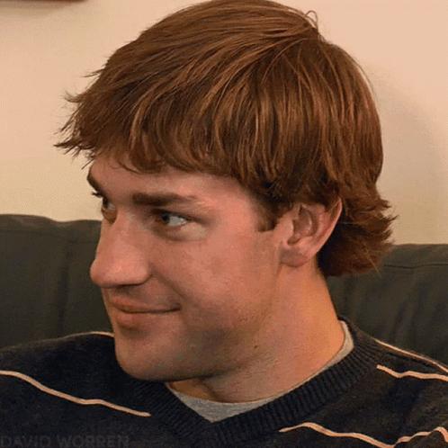 A Close Up Of A Man 'S Face With The Words David Worren Visible GIF