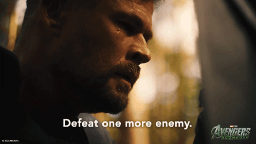 A Close Up Of A Man 'S Face With The Words Defeat One More Enemy GIF