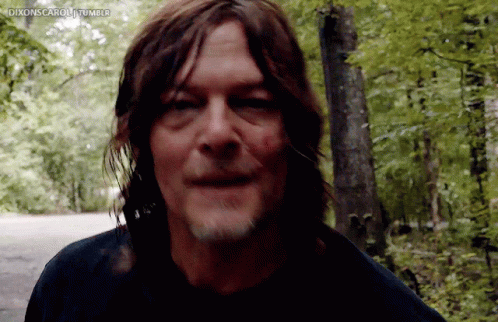 A Close Up Of A Man 'S Face With The Words Dixonscarou Tumblr Written Below Him GIF