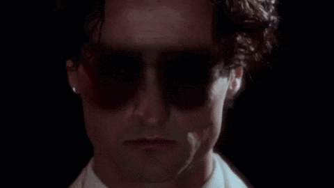 A Close Up Of A Man 'S Face With The Words " Eco Death " Above It GIF