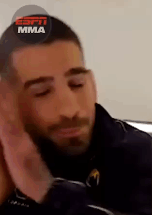 A Close Up Of A Man 'S Face With The Words Espn Mma On The Top GIF