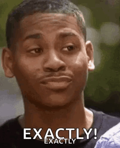 A Close Up Of A Man 'S Face With The Words `` Exactly '' Written On It . GIF