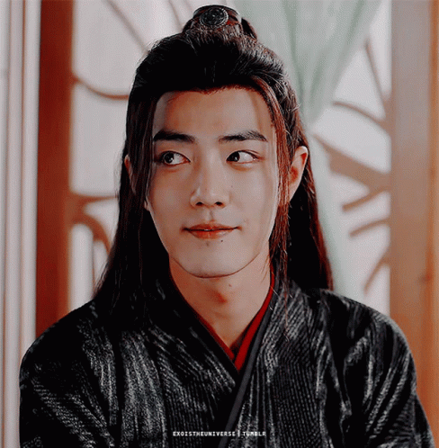 A Close Up Of A Man 'S Face With The Words Exotetheuniverse Tumblr Written Below It GIF