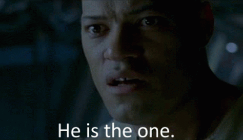 A Close Up Of A Man 'S Face With The Words He Is The One GIF