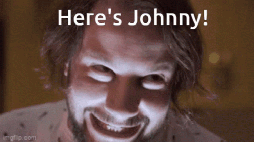 A Close Up Of A Man 'S Face With The Words Here 'S Johnny Above Him GIF