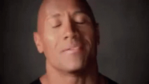 A Close Up Of A Man 'S Face With The Words Hey It 'S Gonna In The Background GIF