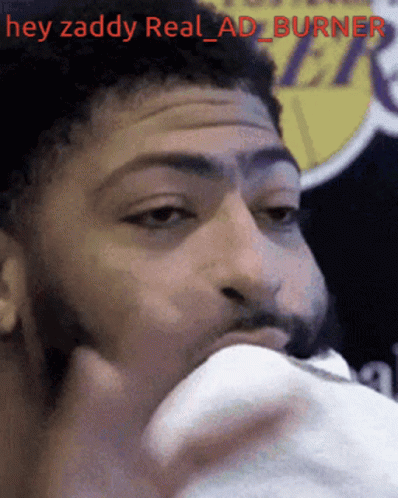 A Close Up Of A Man 'S Face With The Words Hey Zaddy Real Ad Burner GIF