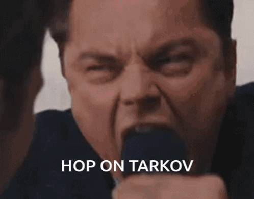 A Close Up Of A Man 'S Face With The Words Hop On Tarkov Written Below Him GIF
