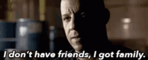 A Close Up Of A Man 'S Face With The Words `` I Do N't Have Friends , I Got Family . '' GIF
