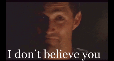 A Close Up Of A Man 'S Face With The Words " I Don 'T Believe You " Below It GIF