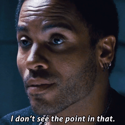 A Close Up Of A Man 'S Face With The Words " I Don 'T See The Point In That " GIF