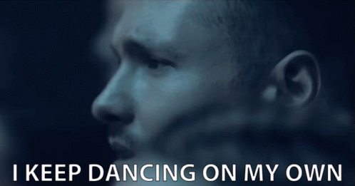 A Close Up Of A Man 'S Face With The Words I Keep Dancing On My Own Below Him GIF