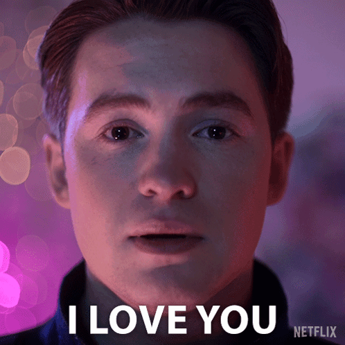 A Close Up Of A Man 'S Face With The Words " I Love You " On The Bottom Right GIF