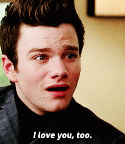 A Close Up Of A Man 'S Face With The Words I Love You Too GIF
