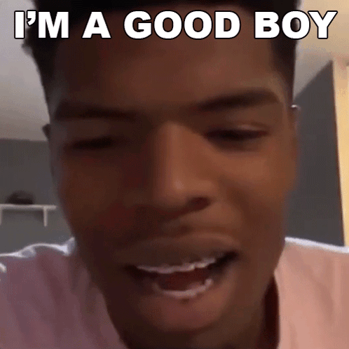 A Close Up Of A Man 'S Face With The Words `` I 'M A Good Boy '' Written Above Him . GIF