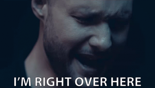 A Close Up Of A Man 'S Face With The Words " I 'M Right Over Here " Below Him GIF