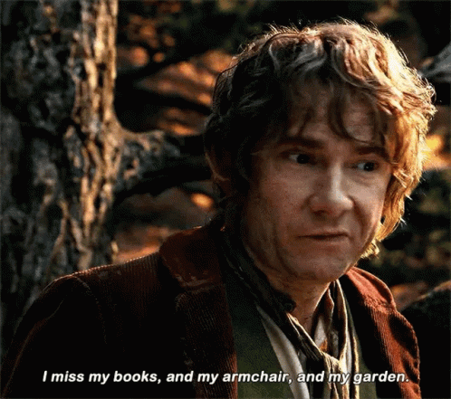 A Close Up Of A Man 'S Face With The Words " I Miss My Books And My Armchair And My Garden " GIF