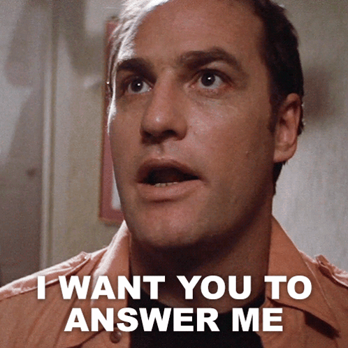 A Close Up Of A Man 'S Face With The Words I Want You To Answer Me Above Him GIF