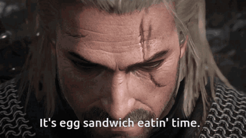 A Close Up Of A Man 'S Face With The Words " It 'S Egg Sandwich Eatin ' Time " Below Him GIF