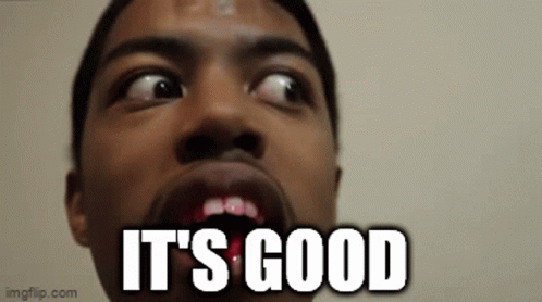 A Close Up Of A Man 'S Face With The Words `` It 'S Good '' Written In White Letters . GIF