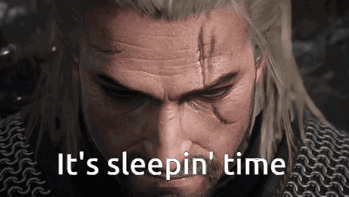 A Close Up Of A Man 'S Face With The Words It 'S Sleepin ' Time GIF